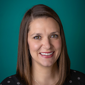 Female nurse practitioner headshot.