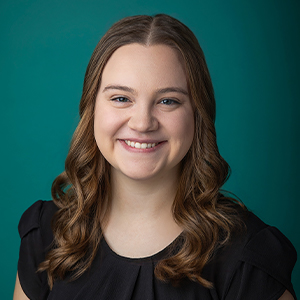 Female physical therapist smiling in professional headshot