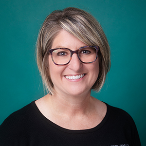 Female general surgery nurse practitioner headshot.