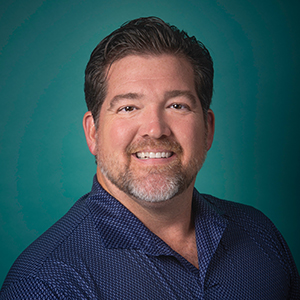 Male general surgery doctor headshot.