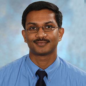 Male infectious diseases & travel medicine doctor headshot