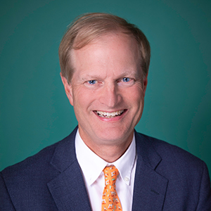 Male urology doctor headshot.