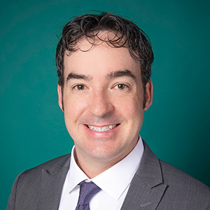 Male orthopedics doctor headshot.