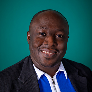 Professional headshot of male nurse anesthetist.