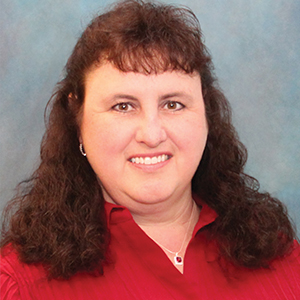 Female urgent care nurse practitioner headshot