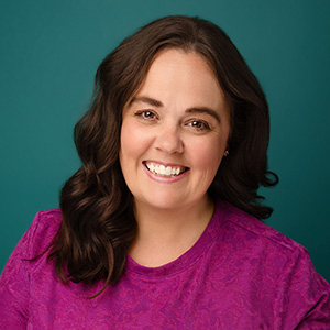 Female counselor smiling in professional headshot