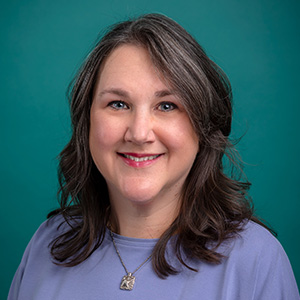 Female nurse practitioner professional headshot.