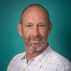 Male family medicine physician assistant headshot.