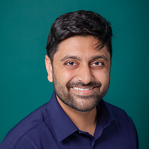 Male trauma surgeon professional headshot.