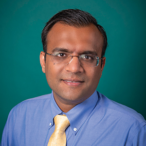 Male hospital medicine doctor headshot.