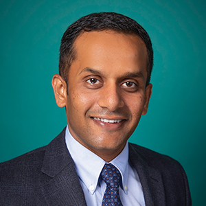Male family medicine doctor headshot.