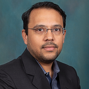 Male hospital medicine doctor headshot.
