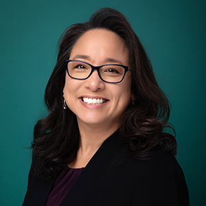 Professional headshot of female nurse practitioner