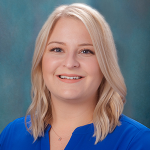 Female hospital medicine doctor headshot.
