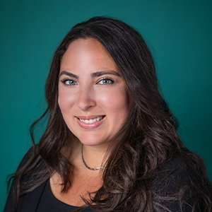 Female internal medicine doctor headshot.