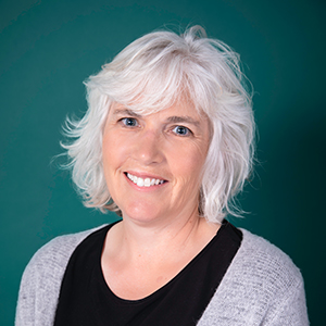 Female physical therapist professional headshot.