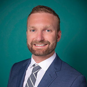 Male orthopedics doctor headshot.