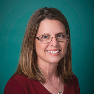 Female internal medicine doctor headshot