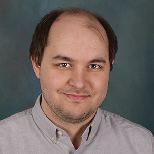 Male hospital medicine doctor headshot.
