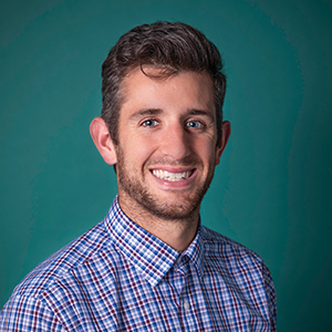 Male physical therapist professional headshot.