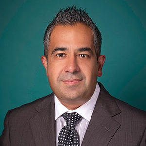 Male orthopedics doctor headshot.