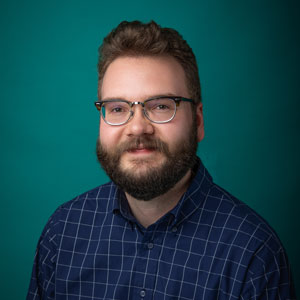 Professional headshot of male counselor