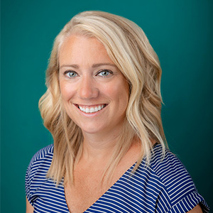 Female nurse practitioner professional headshot.