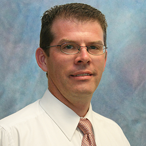Male urgent care physician assistant headshot