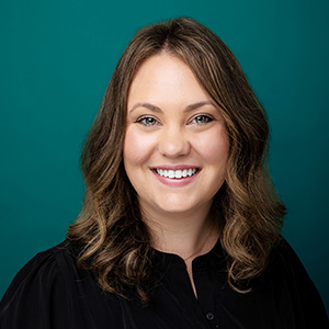 Female nurse practitioner professional headshot.
