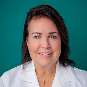 Female women's health doctor professional headshot.