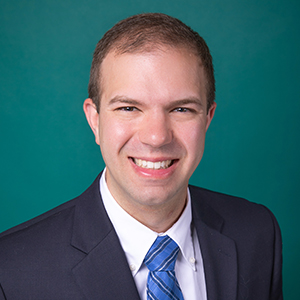 Male hospital medicine doctor headshot.