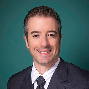 Male orthopedics physician assistant headshot.