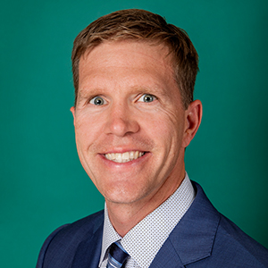Male orthopedics doctor headshot.