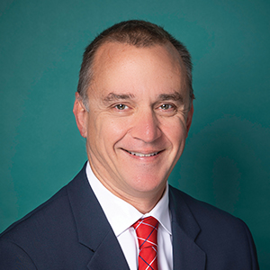 Male orthopedics doctor headshot.
