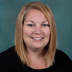 Female hospital medicine nurse practitioner headshot.