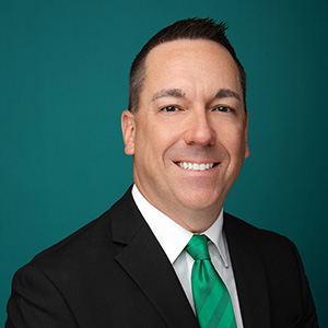 Professional headshot of male nurse practitioner